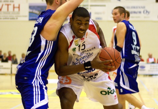 Adrian Henning drives to the basket in the game against Kataja